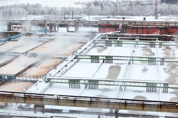 Snow-covered aeration basins in sewerage treatment plant