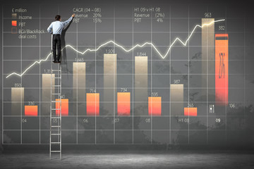 businessman drawing diagram