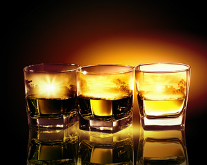 Three glasses of whiskey