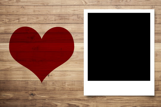 Love heart and Photo frame on Brown wood plank wall texture back