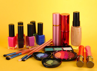 cosmetics on yellow background
