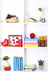 Beautiful white shelves with different home related objects