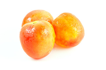 Fresh tomatoes isolated on white background