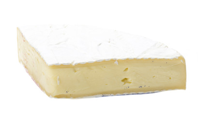A piece of soft brie cheese