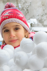 Girl with snowballs