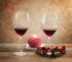 red wine glasses in romantic atmosphere