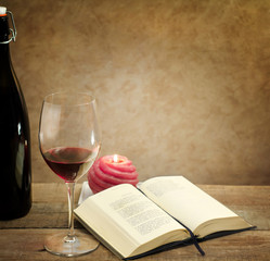 relaxing moment with wine glass and poetry book