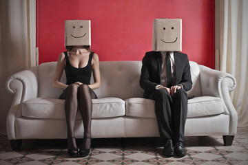 happy couple on sofa