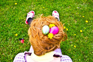 Girl In Grass With Easter Eggs