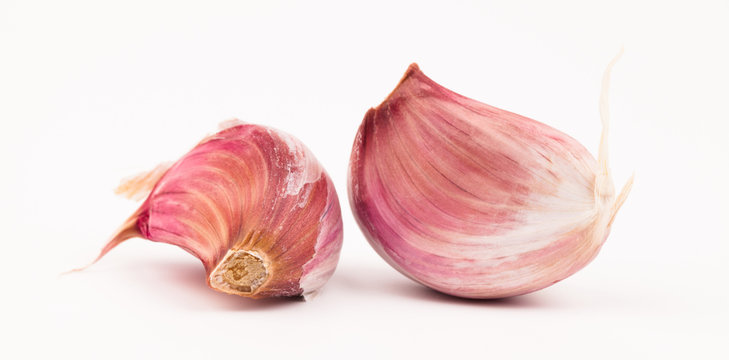 Garlic cloves isolated on white background