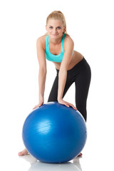 Sporty woman with gymnastic ball