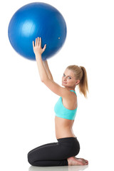 Sporty woman with gymnastic ball