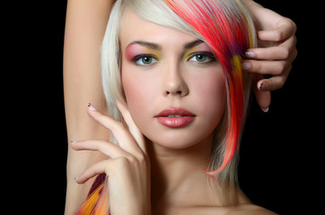 girl with a bright make-up and multi-coloured strand in hair