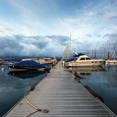 Fototapeta premium Boats docking at Lake Geneva