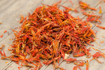 saffron on wooden board closeup