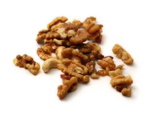 Heap of walnuts on white background