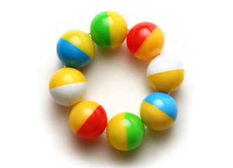 Colourful rattle on white background