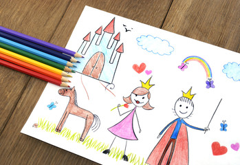 Kids drawing princess and prince