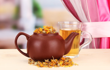 Dried herbs in teapot
