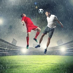 Peel and stick wallpaper Football two football players striking the ball