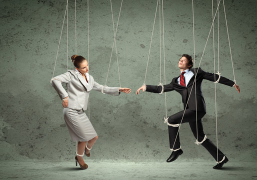 Puppet businesspeople