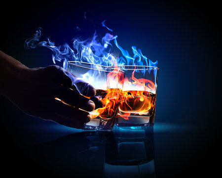 Two glasses of burning absinthe