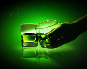 Two glasses of green absinth