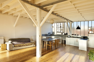 interior wide loft, beams and wooden floor