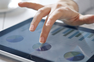 finger touching screen on tablet-pc