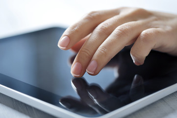 tablet-pc and female hand