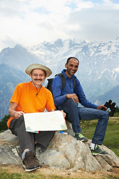 two smiling tourist hiker in india mountains
