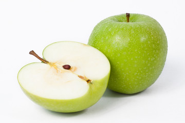 Green apples and half of apple Isolated on a white background
