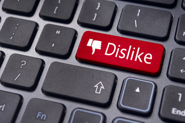 dislike message on keyboard button, antisocial media concepts