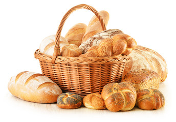  Bread and rolls in wicker basket isolated on white