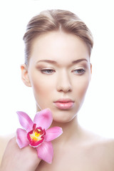 healthy cute woman with clean skin and flower