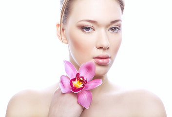 woman with clean skin and flower