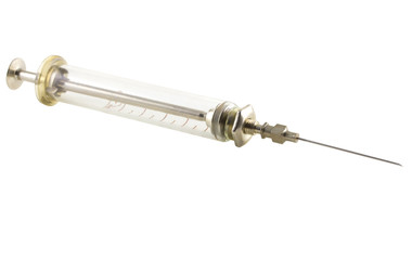 Old syringe on the isolated white background