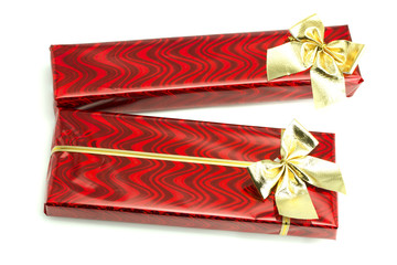 Red gifts with gold bows