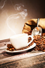 Coffee still life with wooden cup