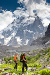 Fototapeta premium Trekker in high mountains of Georgia Caucasus