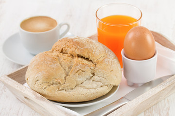 bread with egg, coffee and juice