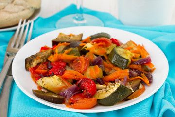 boiled vegetables on the white plate