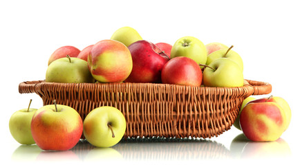 juicy apples in basket, isolated on white