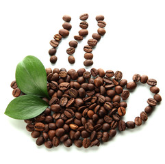 Coffee beans with leaves isolated on white