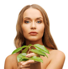 woman with green leaf