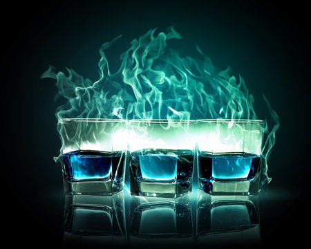 Three glasses of burning emerald absinthe