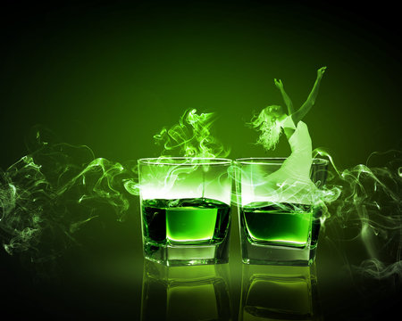 Two glasses of green absinth