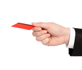 isolated hand of a businessman holding a red credit card