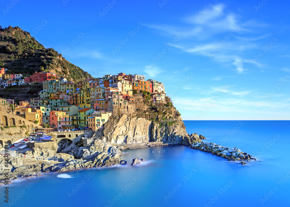 Wall mural Manarola village, rocks and sea at sunset. Cinque Terre, Italy