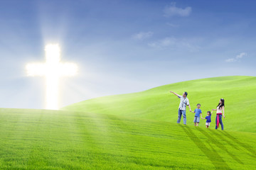 Christian family walk toward the light